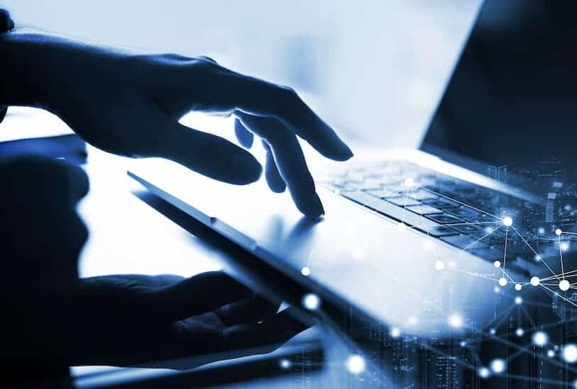 Laptop and operation indicating activity in digital transformation project